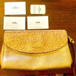 Coach, gold rose, glitter purse